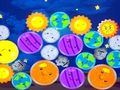 Jeu Fusionner des planètes heureuses  en ligne